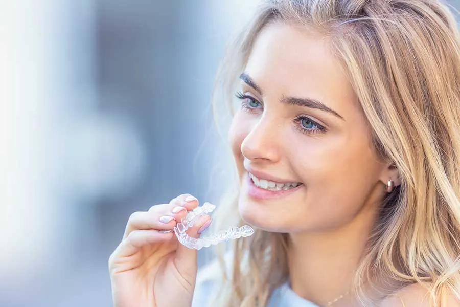 Young female patient about to use clear aligners in Las Vegas.