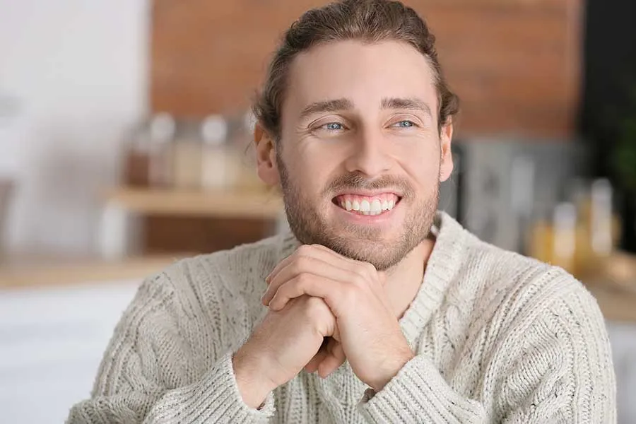 Smiling male patient happy after receiving veneers in Las Vegas. 